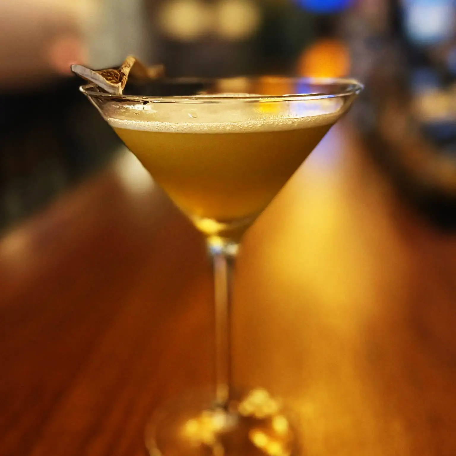 Gin, banana liqueur, dry white vermouth, lime juice