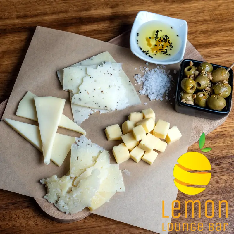 Selection of cheeses with grapes