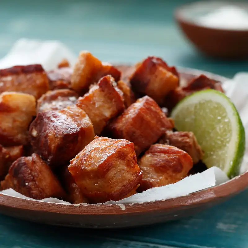 Cuban-style pork bites on beer, served with fried yuca