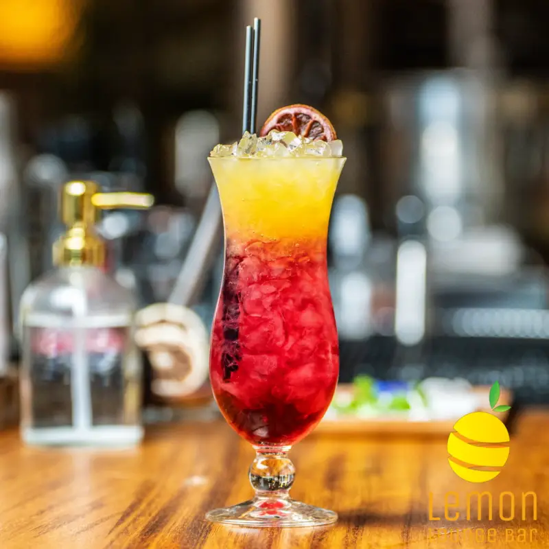 Tequila, orange juice, hibiscus flower syrup